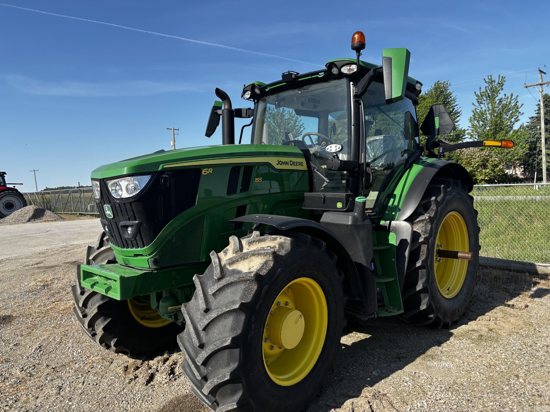 On Lot 2022 John Deere 6R 155 at Tri County Equipment Sandusky, MI