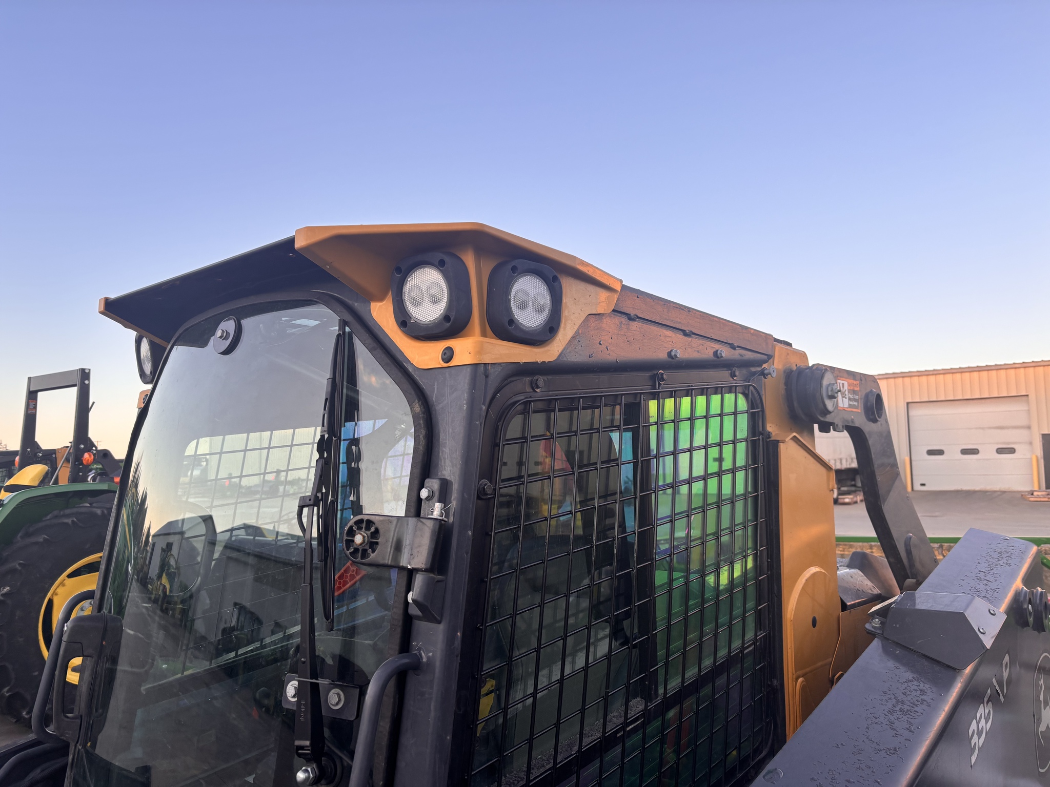 On Lot 2024 John Deere 335 P at Tri County Equipment Sandusky, MI