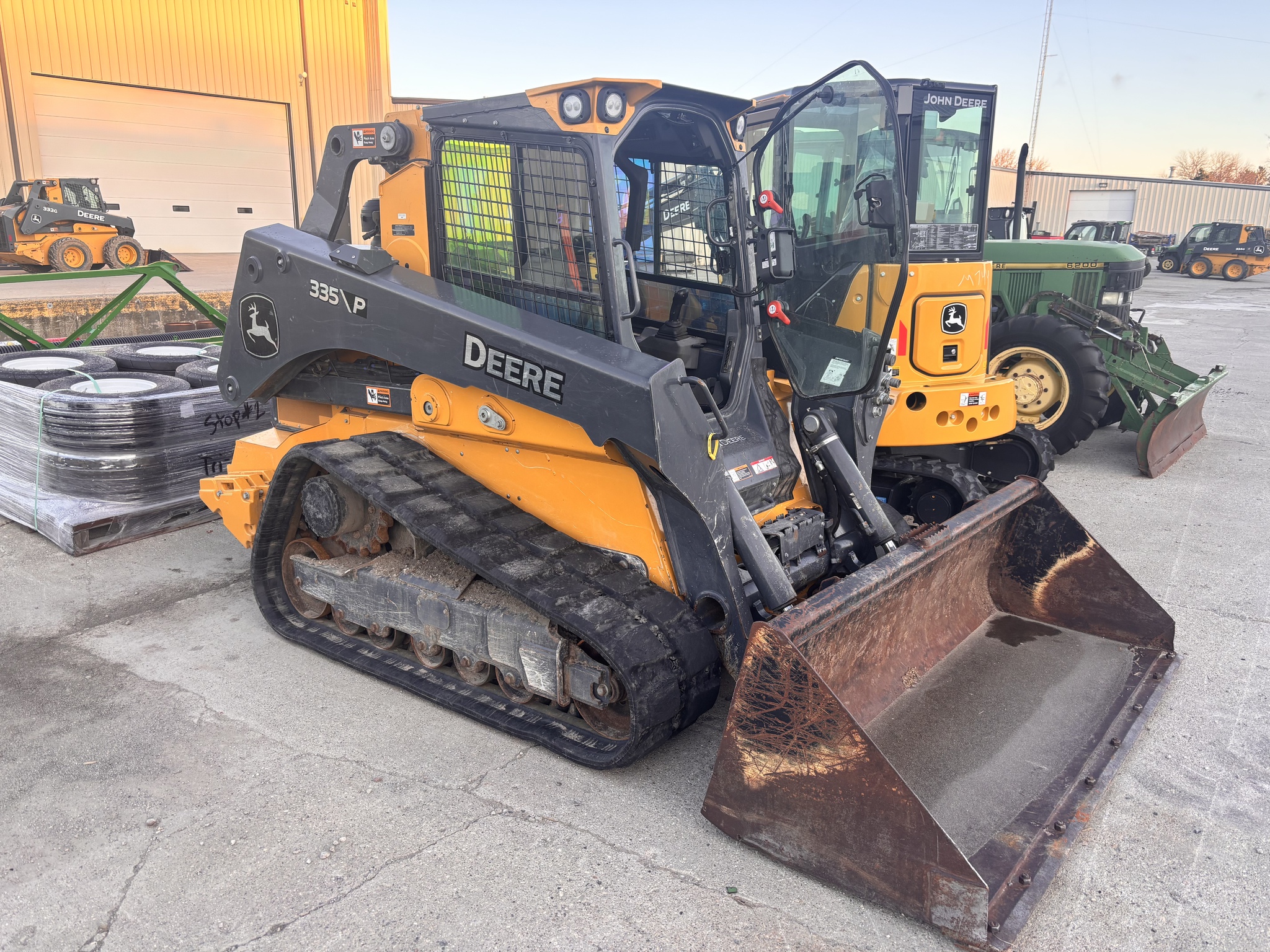 On Lot 2024 John Deere 335 P at Tri County Equipment Sandusky, MI