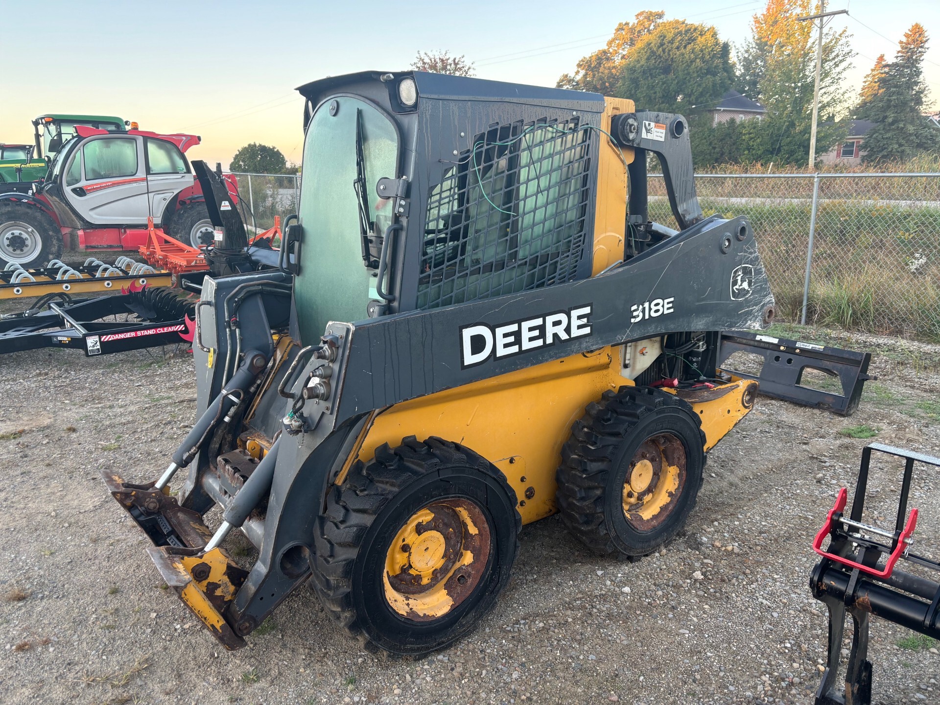 On Lot  John Deere 318E at Tri County Equipment Sandusky, MI