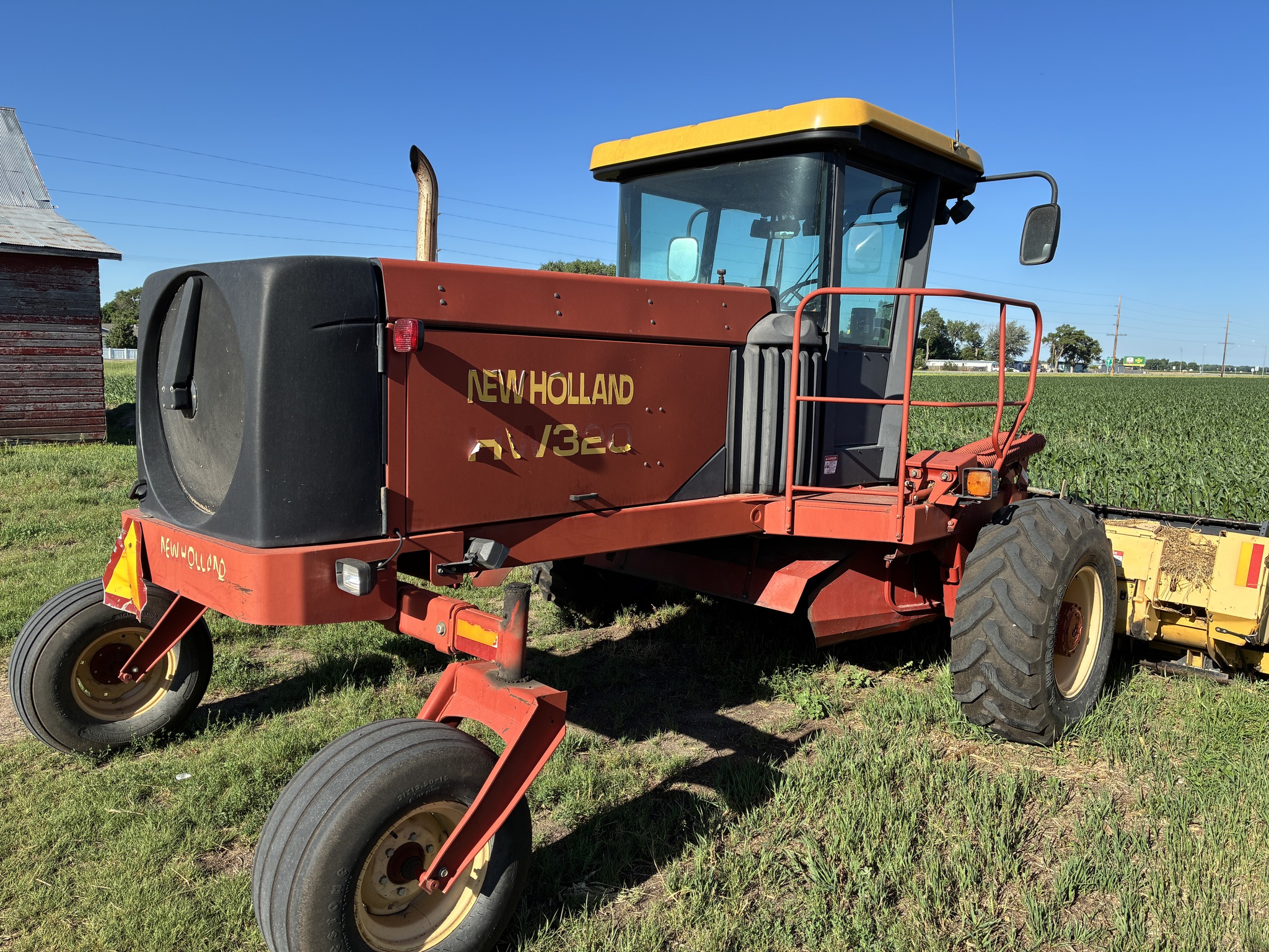  2002 NEW HOLLAND HW320 at LandMark in Gothenburg, NE