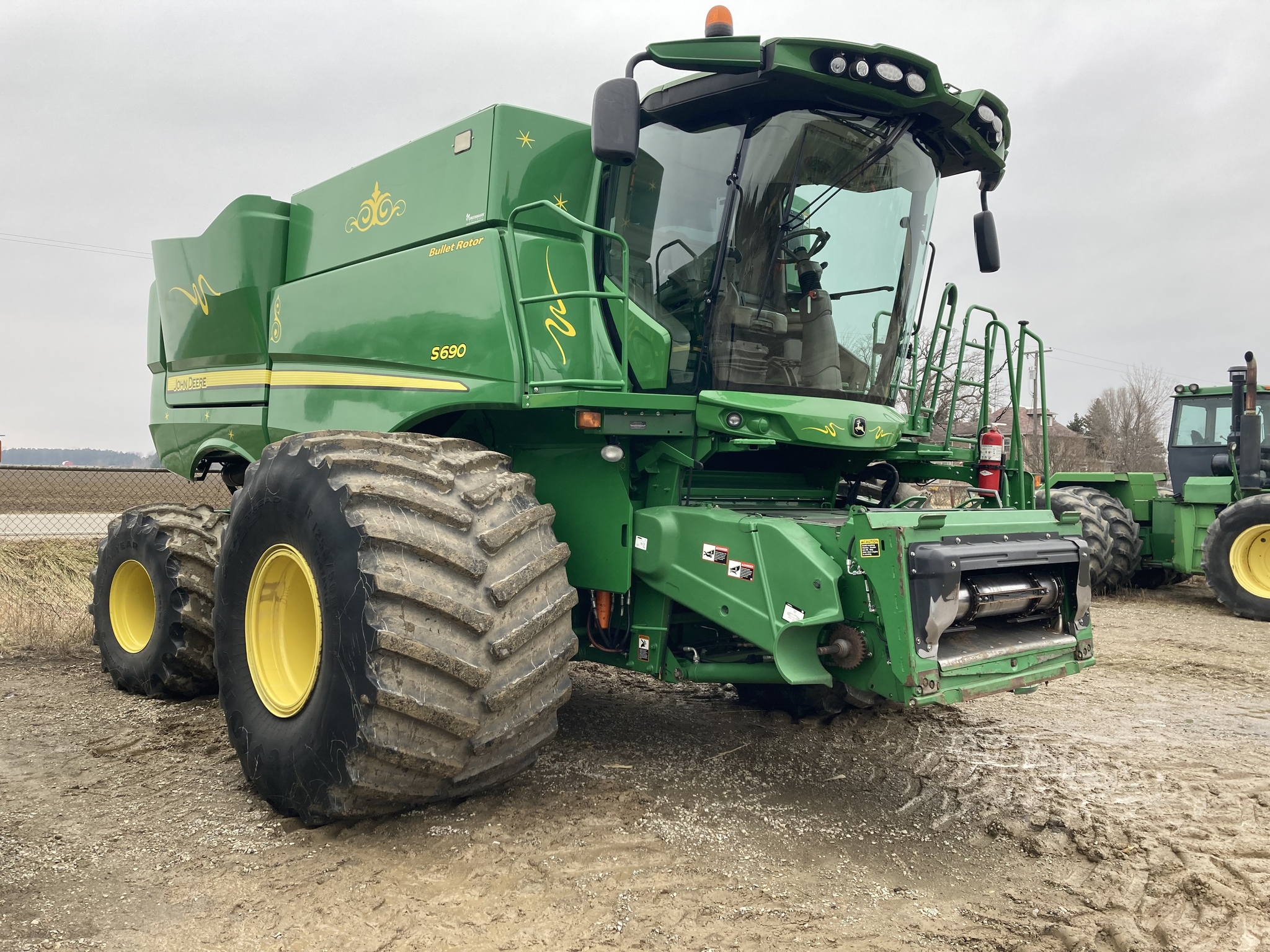 On Lot 2015 John Deere S690 at Tri County Equipment Marlette, MI